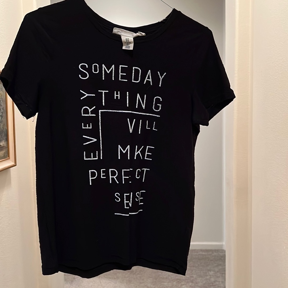 Label of Graded Goods T-shirt. “Someday everything will make perfect sense”.